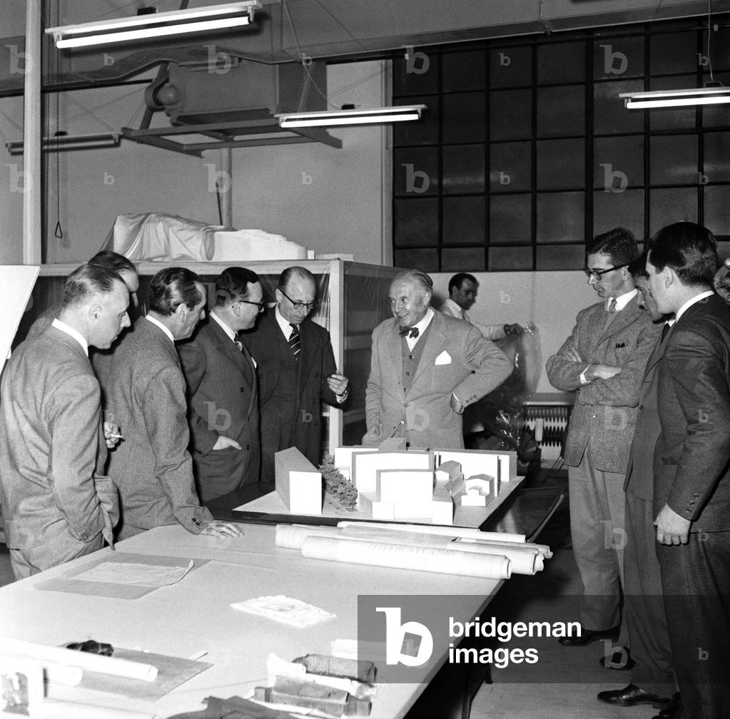 Giovanni Ponti in front of his project, Milan, 1957 (b/w photo)
