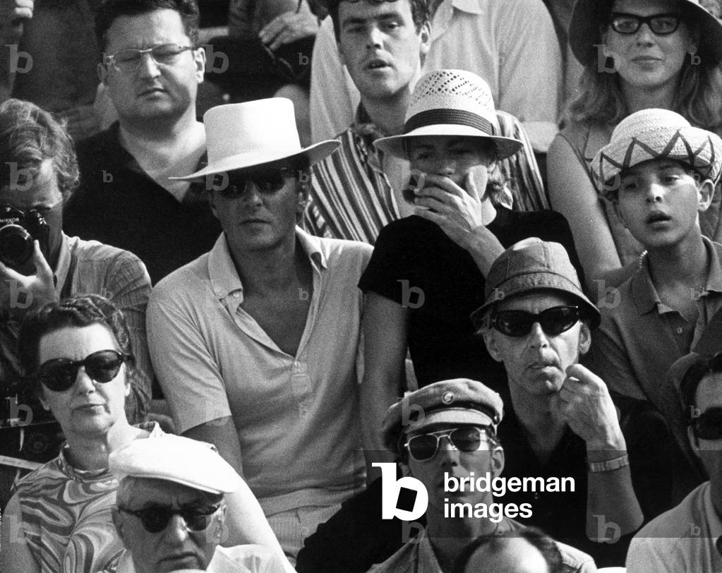 Romy Schneider, Harry Meyen, Herbert Von Karajan and Eliette Mouret, among the spectators of a bullfight, Frejus, 1967 (b/w photo)