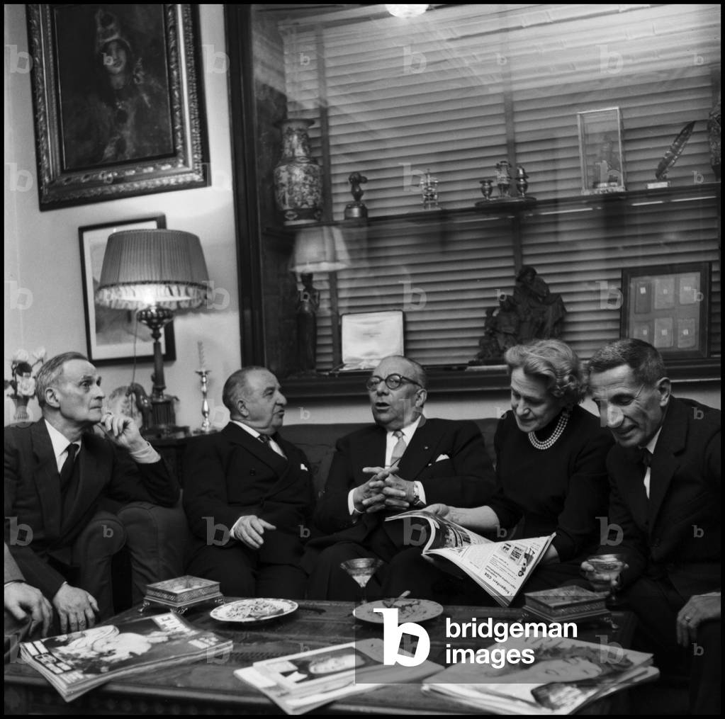 Marino Moretti, Aldo Palazzeschi, Arnoldo Mondadori, Gianna Manzini and Dino Buzzati at the party at Mondadori publisher, Milan, 1958 (b/w photo)