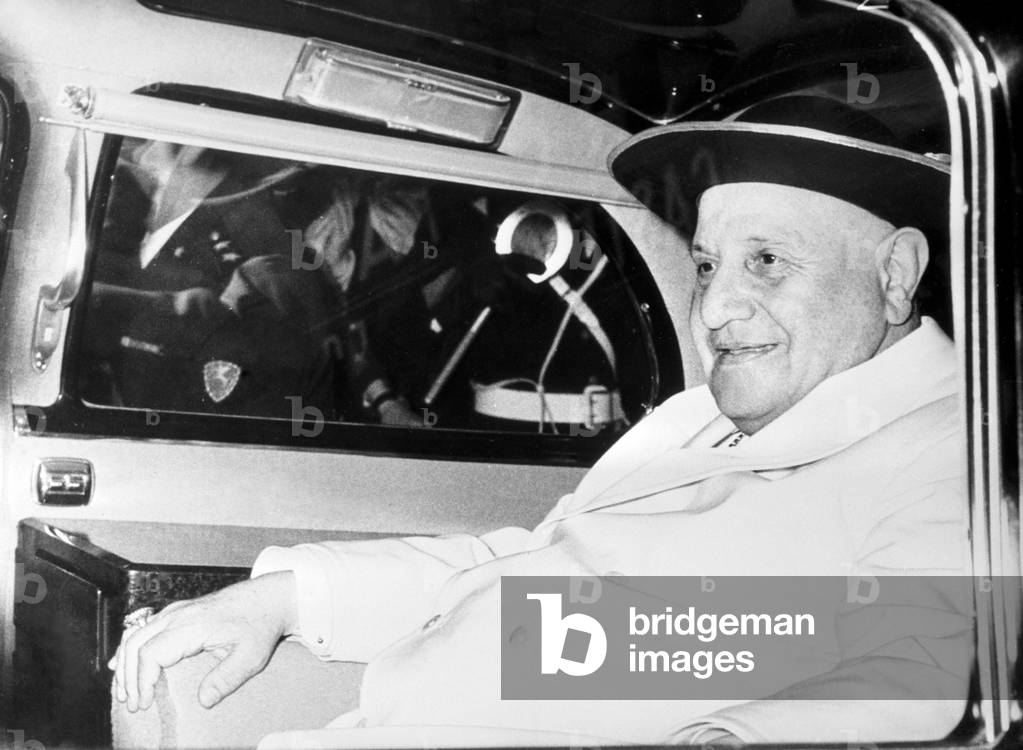 Pope John XXIII in his car on the way to the residence of Castelgandolfo, 1958 (b/w photo)