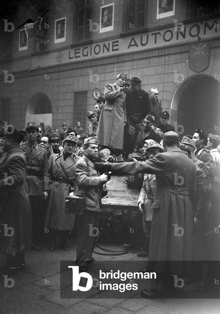 Visit of Benito Mussolini and fascist secretary Alessandro Pavolini to the Legion Muti headquarters, Milan, 1944 (b/w photo)