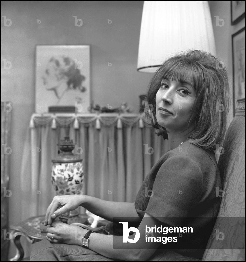 Journalist Oriana Fallaci in her home, Milan, Italy, 1962 (photo)
