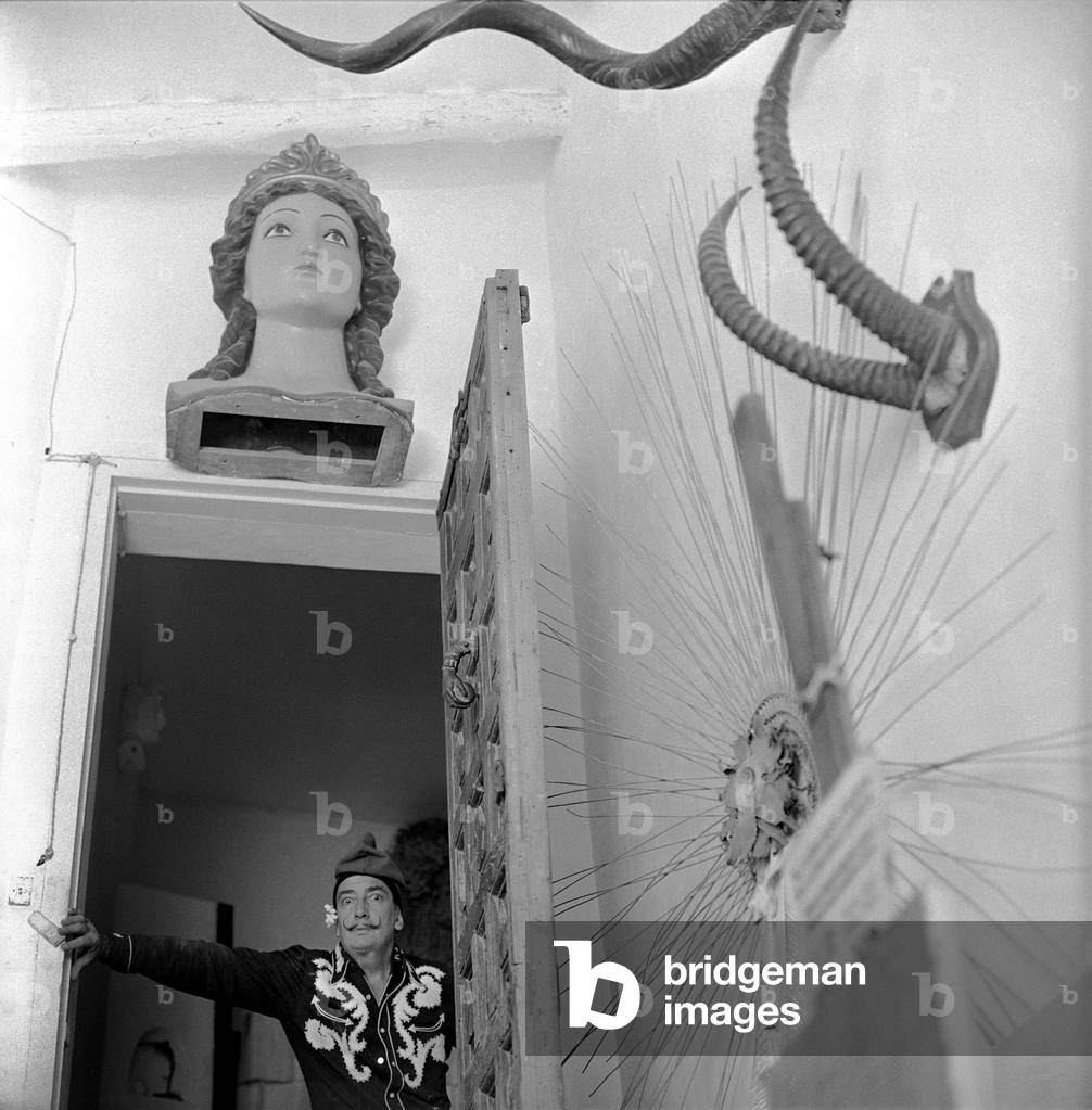 Salvador Dali at home, Port Lligat, Spain, 1957 (b/w photo)