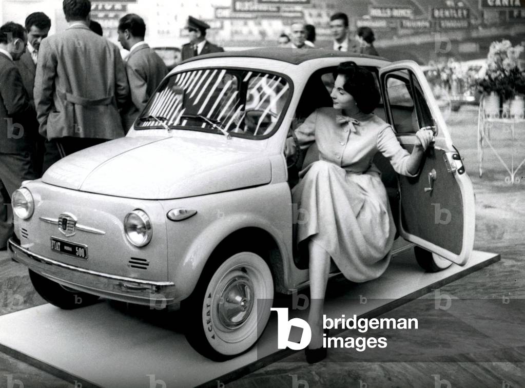The fiat 500 model at the Turin Motor Show, Italy, 1957 (b/w photo)