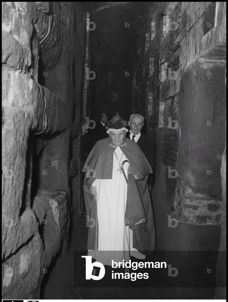 Pope John XXIII visiting the catacombs of St Callisto, Rome, 1961 (b/w photo)