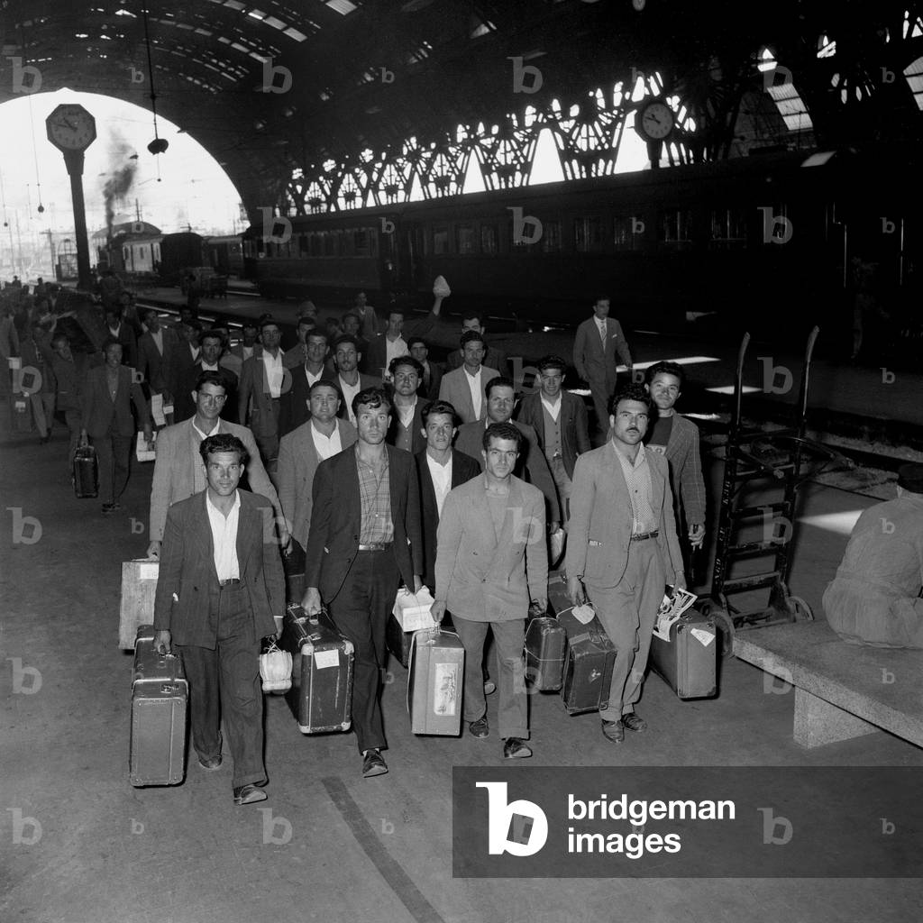 The departure of Italian emigrants for Belgium at the central station, Milan, 1955 (b/w photo)