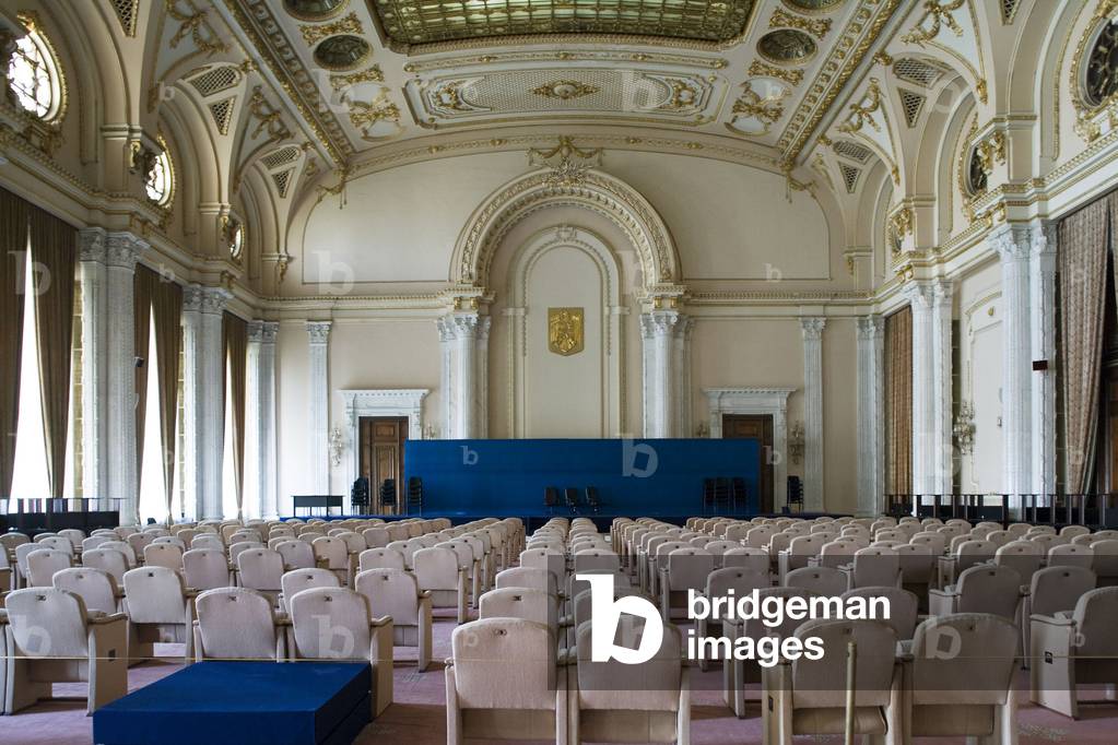 The interior of the Palace of Parliament (1984) (formerly the House of the People) in Bucharest, Romania. The House of the People and the Boulevard of the Victory of the Socialist was inaugurated by Nicolas Ceaucescu on 25 June 1984. This pharaonic project is the second largest building in the world after the Pentagon - 45,000 m2 of floor area, 400,000 m2 of living space. To build this palace, one fifth of the city was razed. The palace is now the palace of the parliament now serves as a chamber of deputes and senators. Photography 10/10/05.