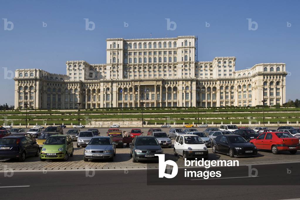 The Palace of Parliament (1984) (formerly the House of the People) in Bucharest, Romania. The House of the People and the Boulevard of the Victory of the Socialist was inaugurated by Nicolas Ceaucescu on 25 June 1984. This pharaonic project is the second largest building in the world after the Pentagon - 45,000 m2 of floor area, 400,000 m2 of living space. To build this palace, one fifth of the city was razed. The palace is now the palace of the parliament now serves as a chamber of deputes and senators. Photography 10/10/05.
