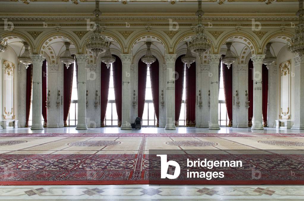 The interior of the Palace of Parliament (1984) (formerly the House of the People) in Bucharest, Romania. The House of the People and the Boulevard of the Victory of the Socialist was inaugurated by Nicolas Ceaucescu on 25 June 1984. This pharaonic project is the second largest building in the world after the Pentagon - 45,000 m2 of floor area, 400,000 m2 of living space. To build this palace, one fifth of the city was razed. The palace is now the palace of the parliament now serves as a chamber of deputes and senators. Photography 10/10/05.