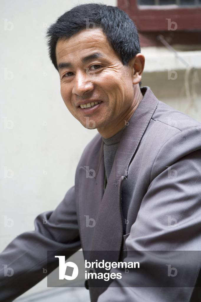 Portrait of a resident in the Puxi district of Shanghai, China.
