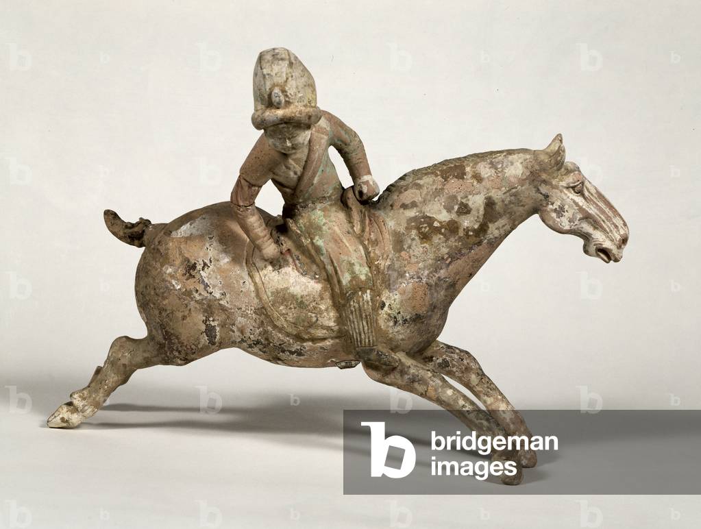 1969- (M) 35 Tomba figura di un giocatore di polo femminile, forse Yang Guei-fei, cinese, dinastia Tang (618-9