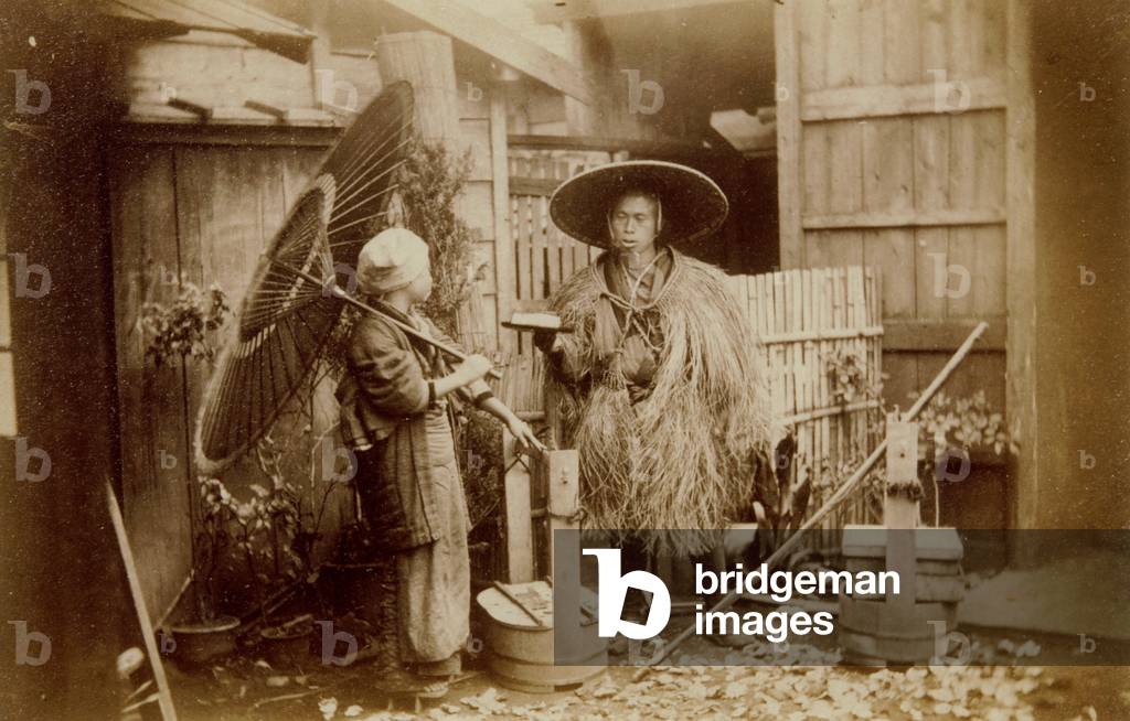 Man in raincoat and Woman with umbrella, 1880-1895
