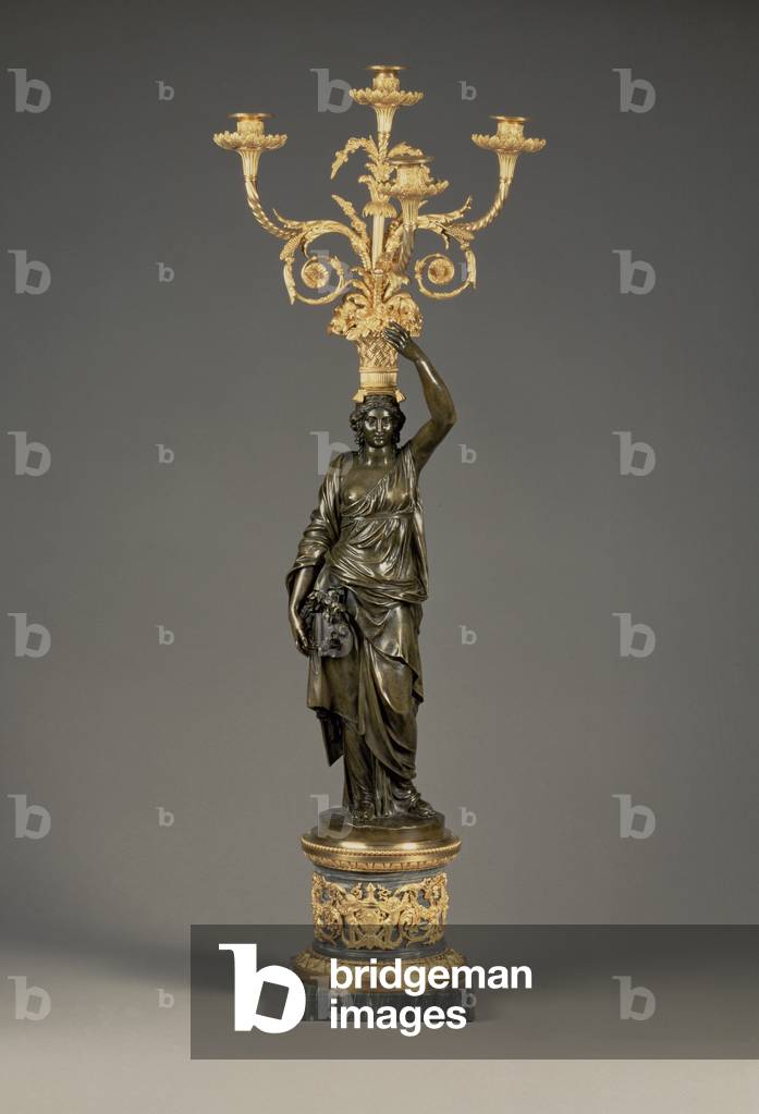 Louis XVI four-light candelabra, ormolu branches rising from a basket balanced on the head of a patinated bronze maiden standing on a cylindrical base of bleu turquin marble, c.1775
