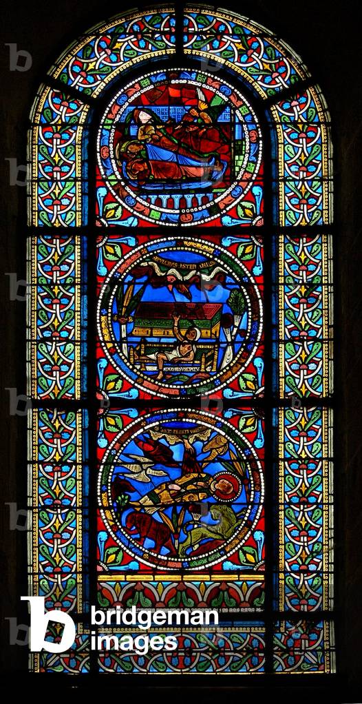 Window wXVII depicting three assembled panels: two in connection with Stephen, the other from a Nativity (stained glass)
