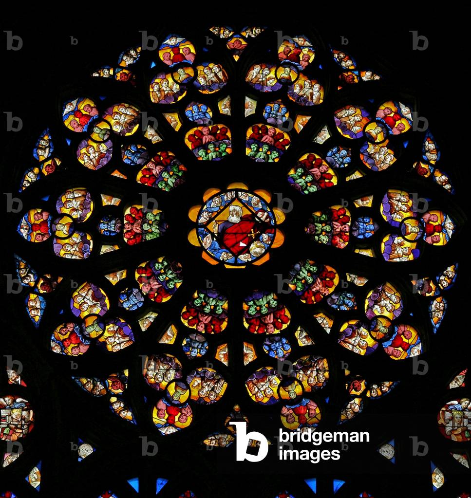 Window w120 the south rose window depicting God the Father surrounded by cherubim and angels. In the lancets: the life of Moses (rose window - internal)