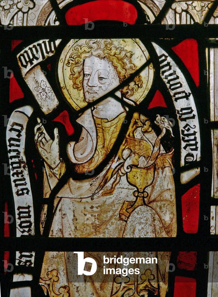 A south window depicting St John (stained glass)