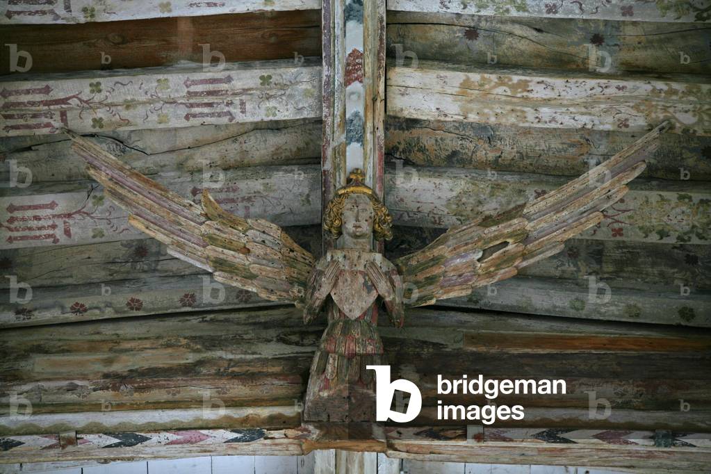 Depicting a view of one of the carved wooden angels in the nave