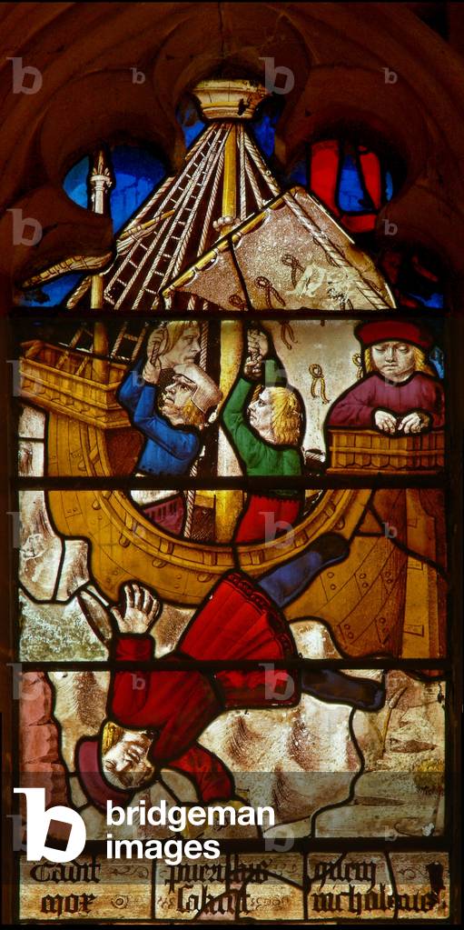 Window SaEw depicting a scene from a legend of St Nicholas: the miracle of the boy and the cup: the boy entrusted with a Golden Cup falls in the sea en route to Bari. (stained glass)