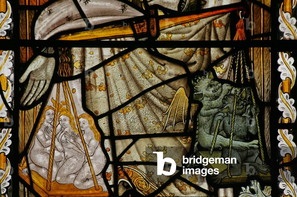 Window Na depicting St Michael's scales with devil and souls in the scales (stained glass)