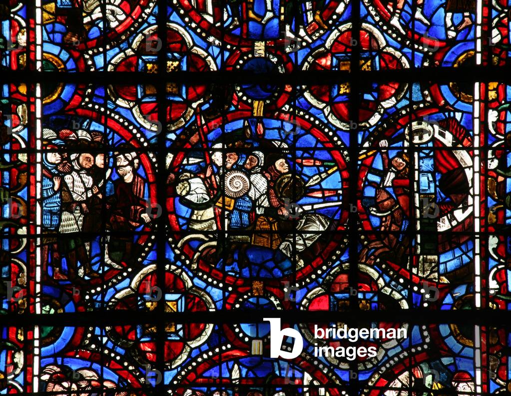 Window w17-L depicting Adonibezek? with a group of soldiers and a person with bound hands; A battle scene outside a city that is on fire (stained glass)