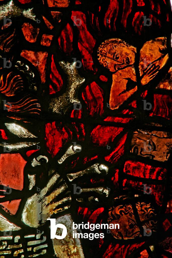 Window w14 depicting the devil chained in Hell (stained glass)