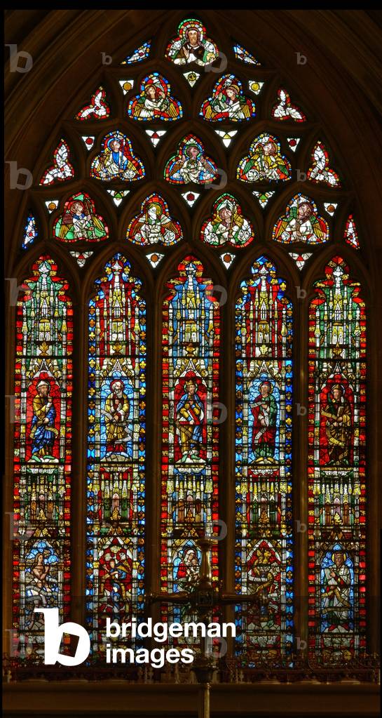 Window e-1 depicting Noah, Abraham, David, Isaiah and Malachi; Eve, the Serpent, Virgin and Child, the Brazen Serpent and Moses (stained glass)