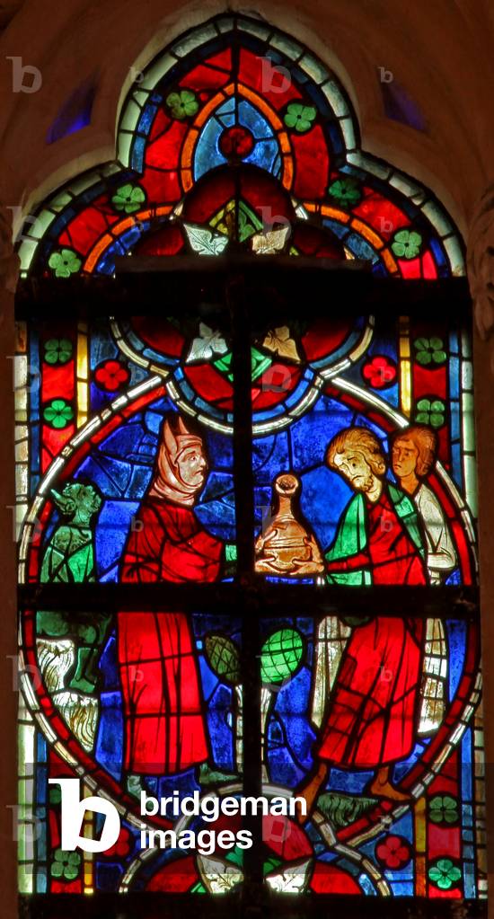 Window w209 depicting a scene from a legend of St Nicholas: a devil gives travellers a liquid (stained glass)