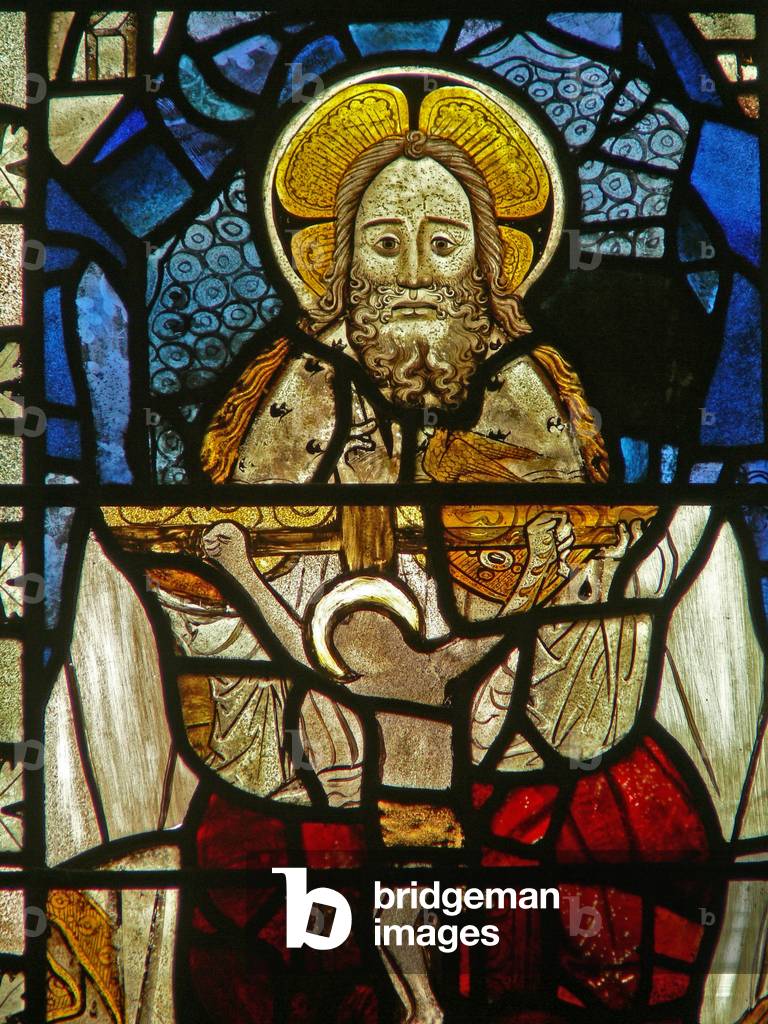 The East window (Ew) depicting a composite panel of the Trinity (stained glass)