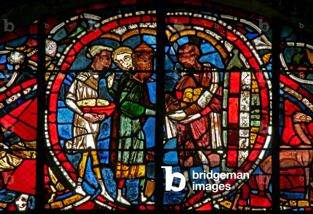 Window w12-R depicting a scene from the Prodigal Son story: he receives his inheritance (stained glass)