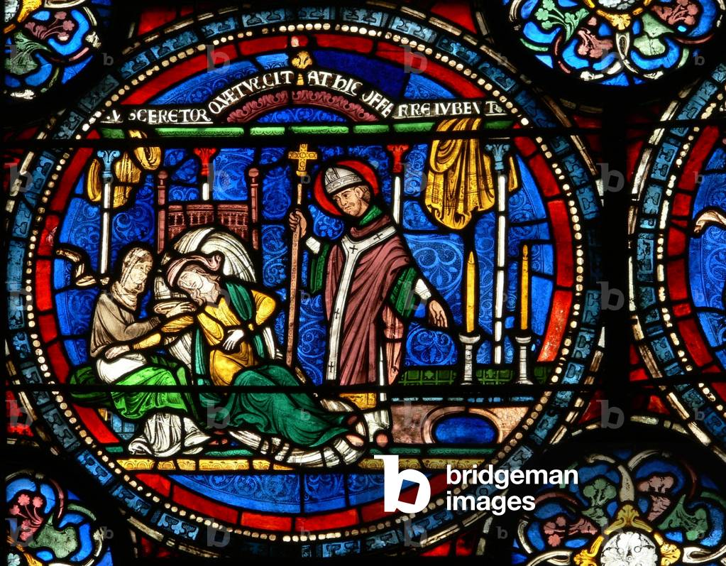 Window n4 depicting a scene from a St Thomas Becket Miracle window: Julia Puintel told to go to the tomb (stained glass)