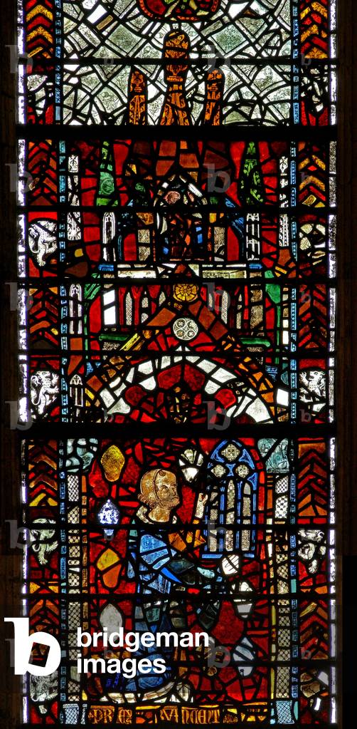 Window w39 depicting a donor giving the window (stained glass)