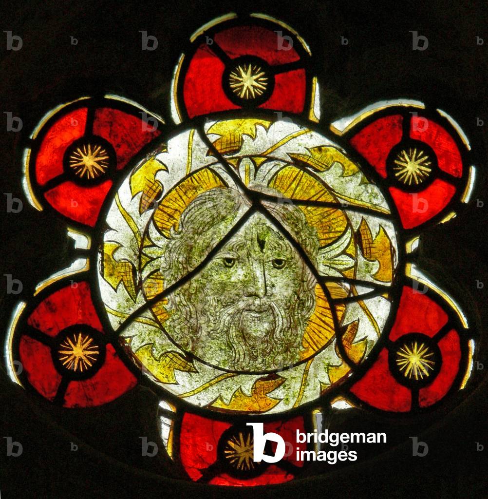 A north window depicting the Head of Christ (stained glass)