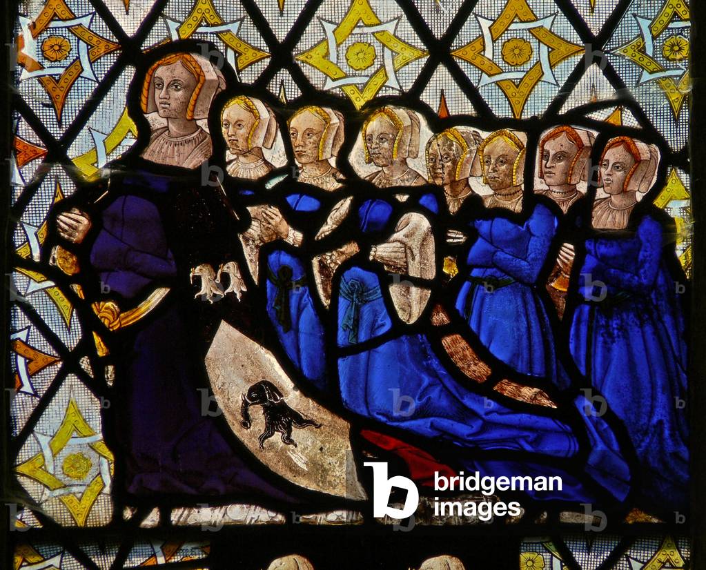 Window S4 depicting sobel Saunders, wife of Walter Curson and their seven daughters (stained glass)