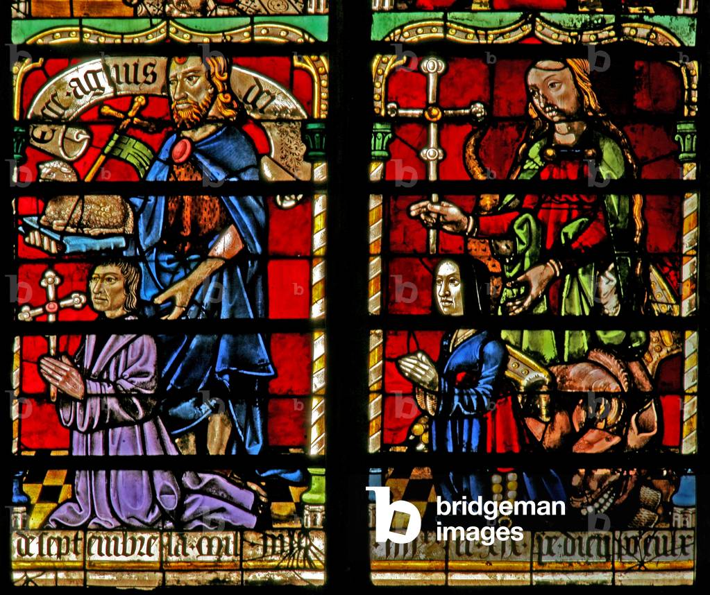 Window w236 depicting a donor - Jean Corart and wife with St John Baptist and St Catherine (stained glass)