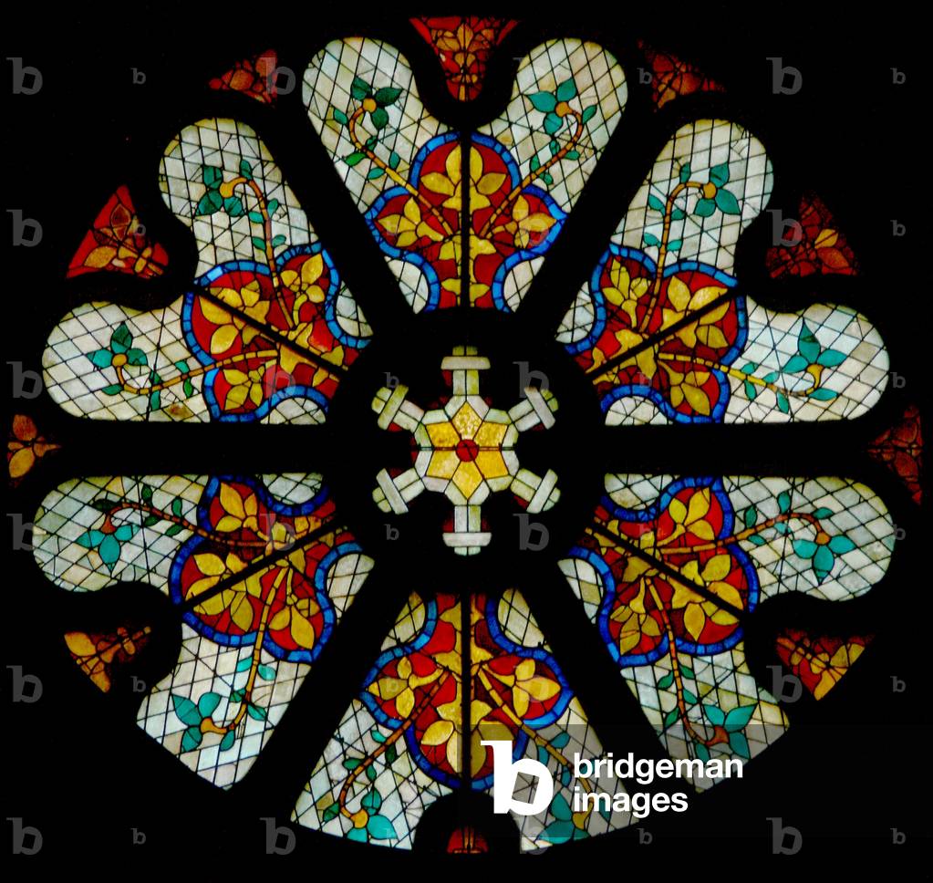 Window w107 a north rose window with patterned modern glass (rose window - internal)