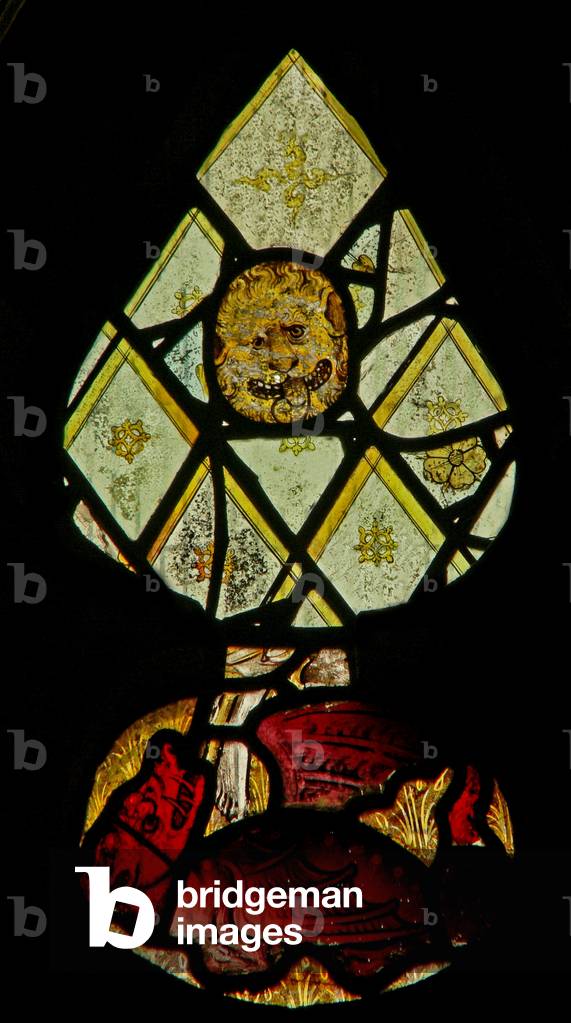 Window S4 depicting a dragon and a lion's head (stained glass)