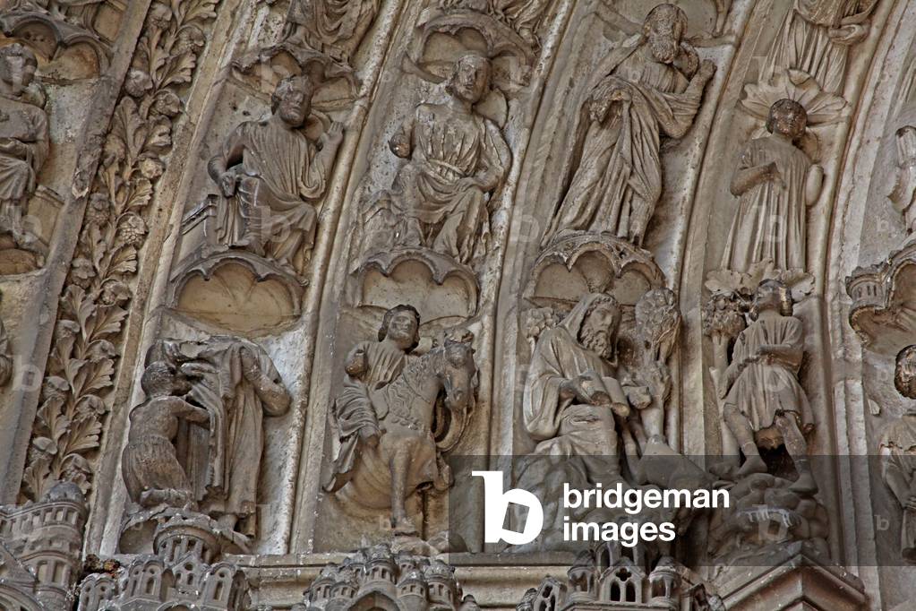 Chartres, Cathedral: South portal central bay left archivolts: Scenes from the life of St Giles with Confessors above (photo)