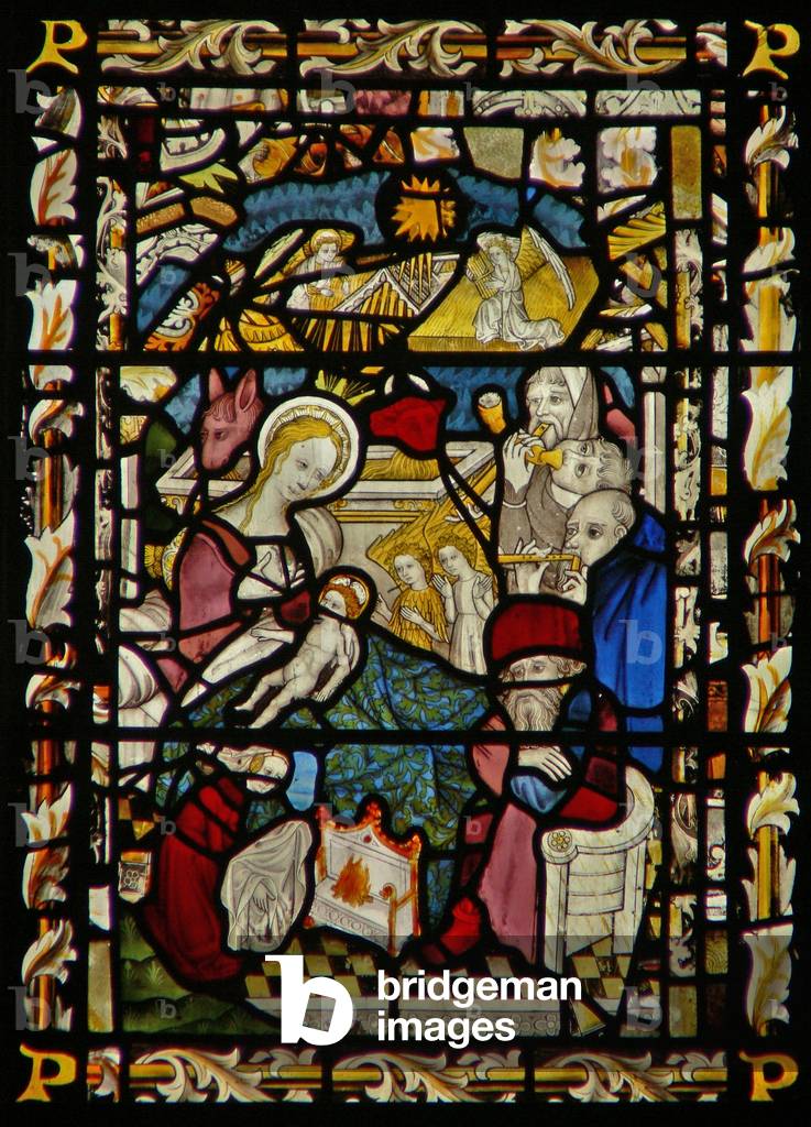 The east window depicting the Adoration of the Shepherds (stained glass)