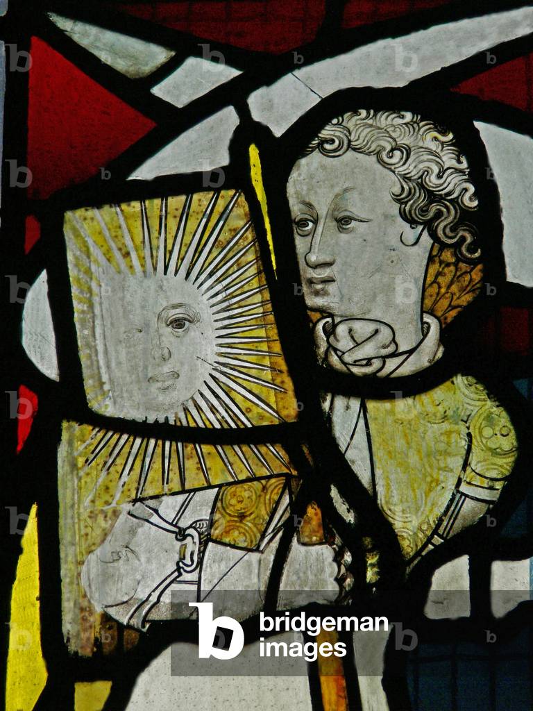 Window S5 depicting an angel with a flag with the sun and a face (stained glass)