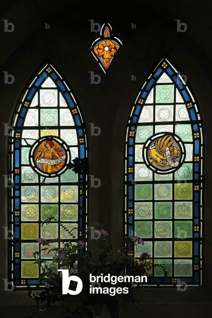 Evangelist emblems: St Matthew and St Mark (stained glass)