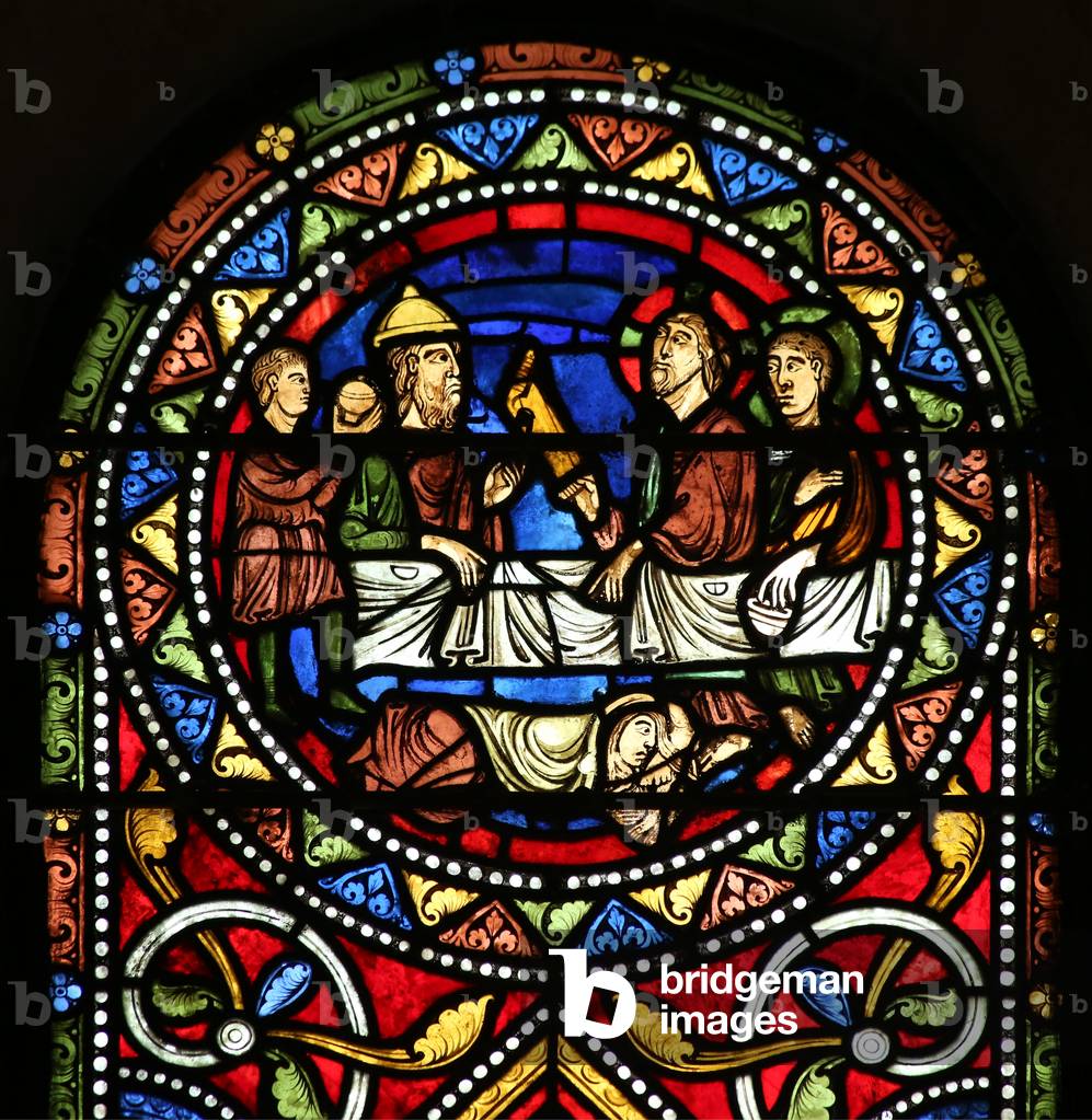Window w13 depicting the Charity of St Nicholas. He pays for a sick man's daughters to avoid going into prostitution (stained glass)