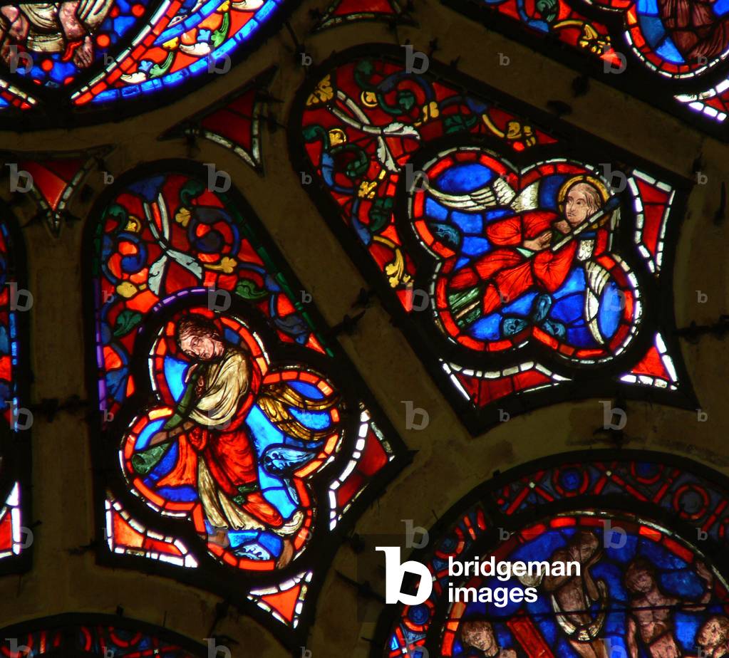 Window Ww depicting angels, one with Passion Instrument the other with trumpet (stained glass)