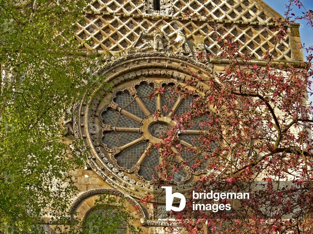 Depicting the Wheel of Fortune on the north façade
