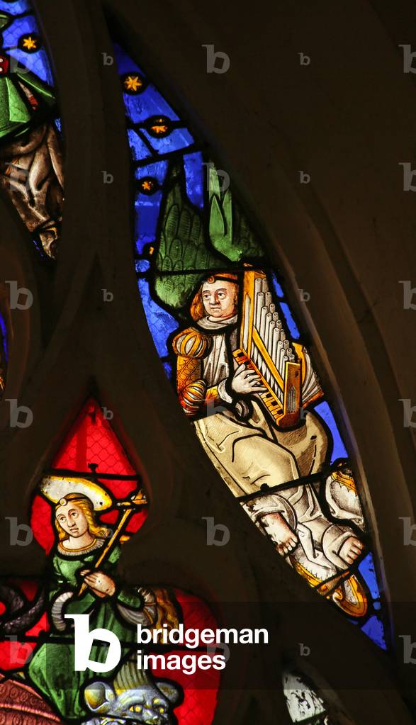 Window depicting Musical Angel with Organ (stained glass)