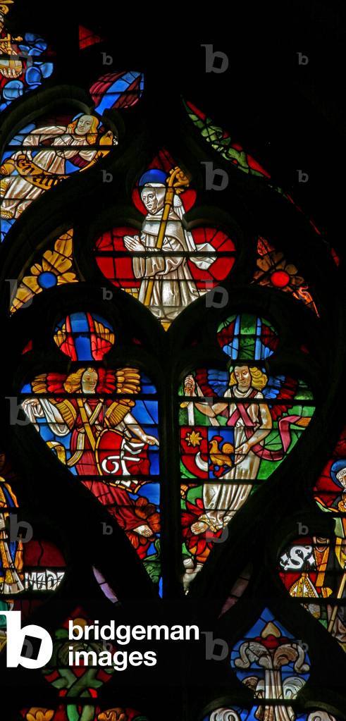 Window w232 depicting tracery lights with angels and St Bernard (stained glass)