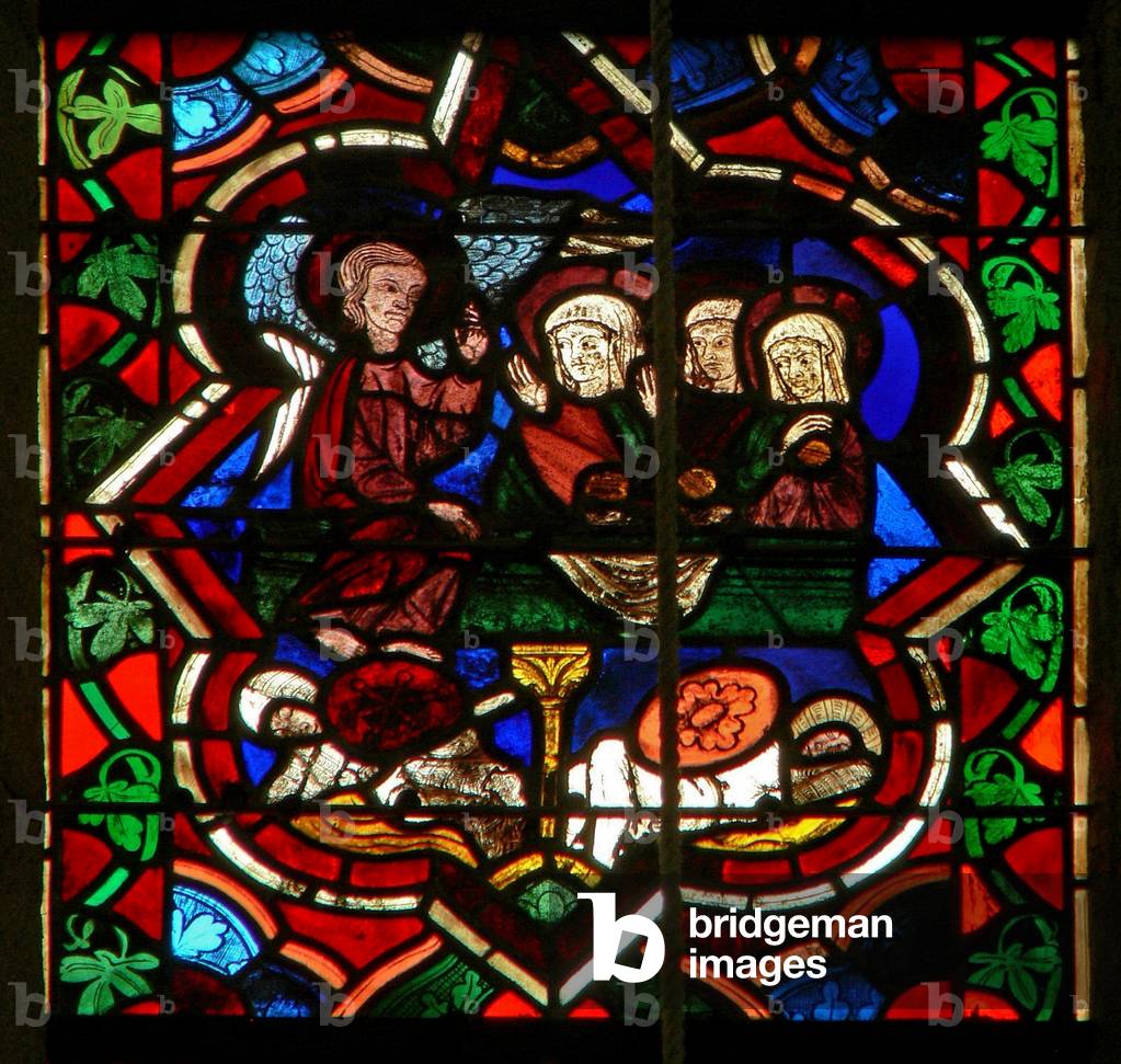 Scene in the E window depicting the three Marys at the Resurrection tomb (stained glass)