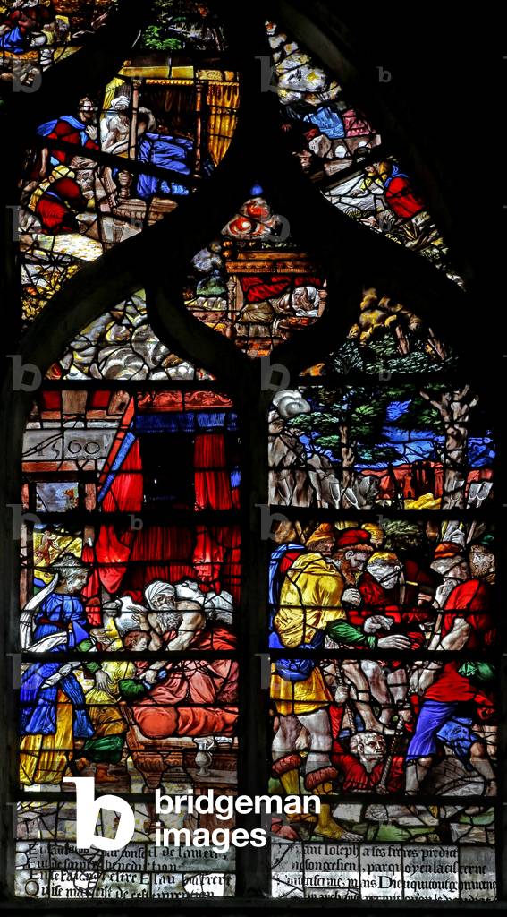 Window w126 depicting Jacob obtains Isaac's Blessing; Joseph is lowered into the pit (stained glass)