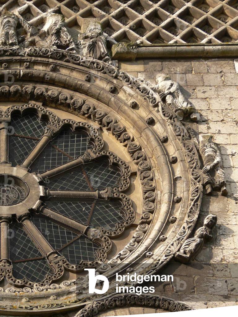 Depicting the Wheel of Fortune on the north façade