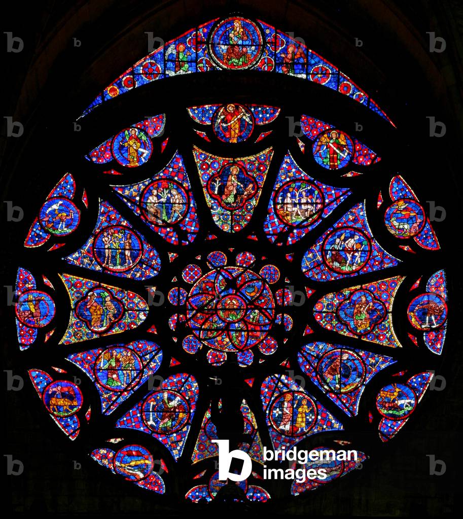 Window w115 depicting the Creation (partly modern) (rose window - internal)