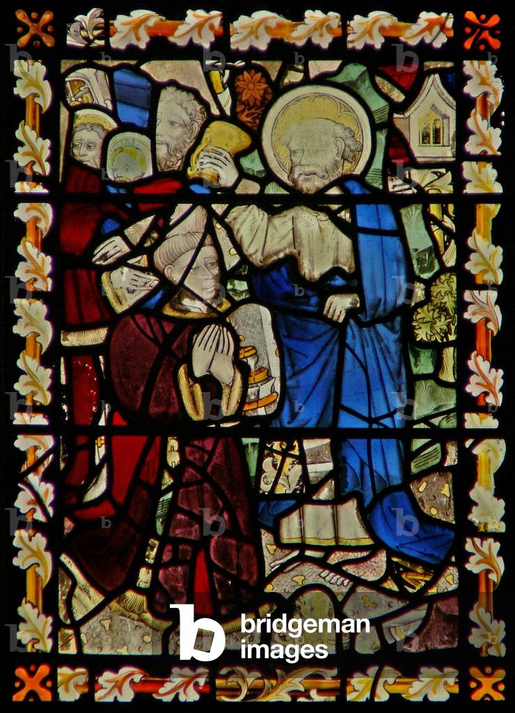 The east window depicting St Peter baptising a young man (stained glass)